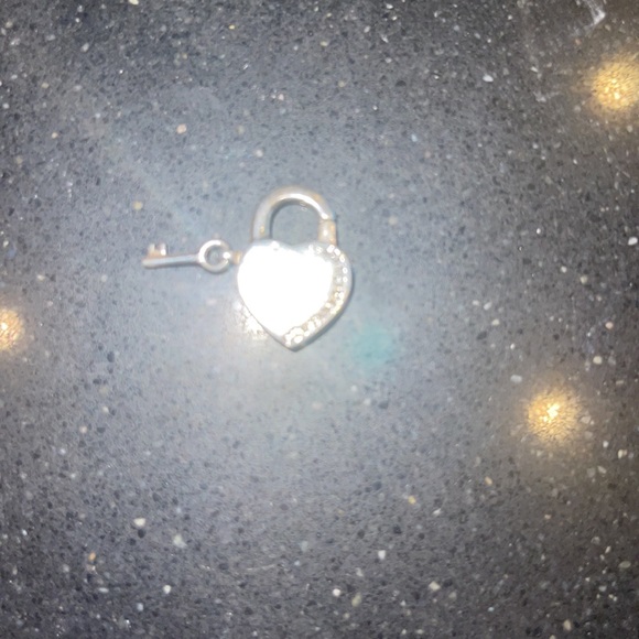 Tiffany’s Heart and Lock charm. It’s a small charm maybe 1/2” - Picture 3 of 5